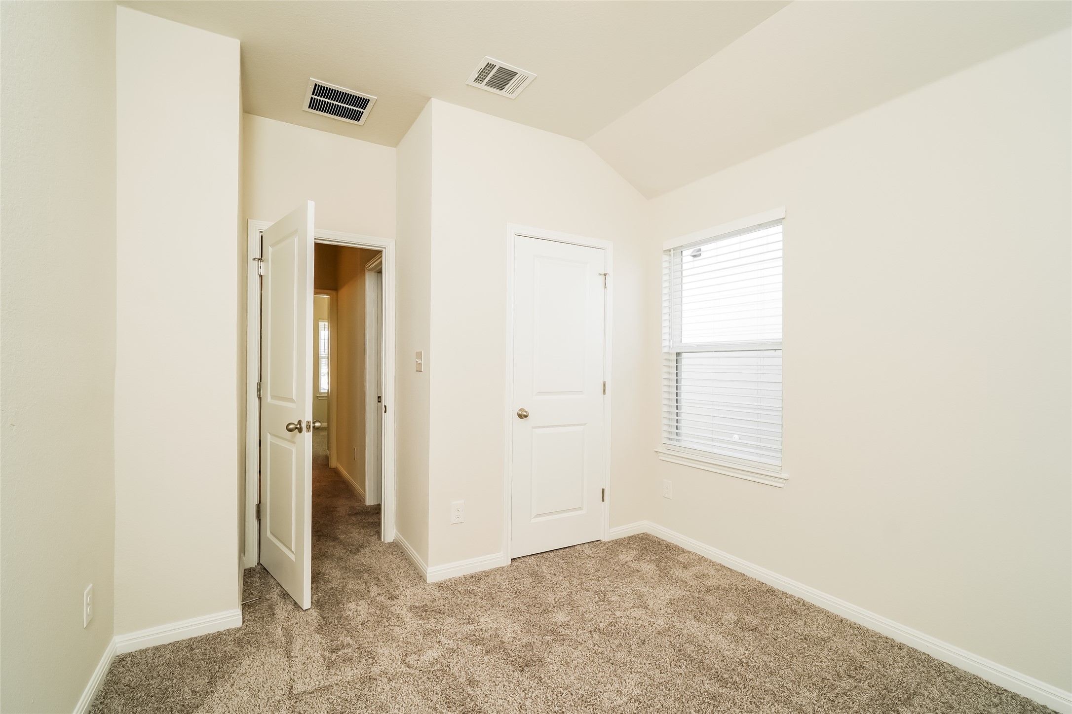 200 Babblebrook Way Hutto, TX 78634 - Photo 12 of 16 a view of an empty room with closet and a window