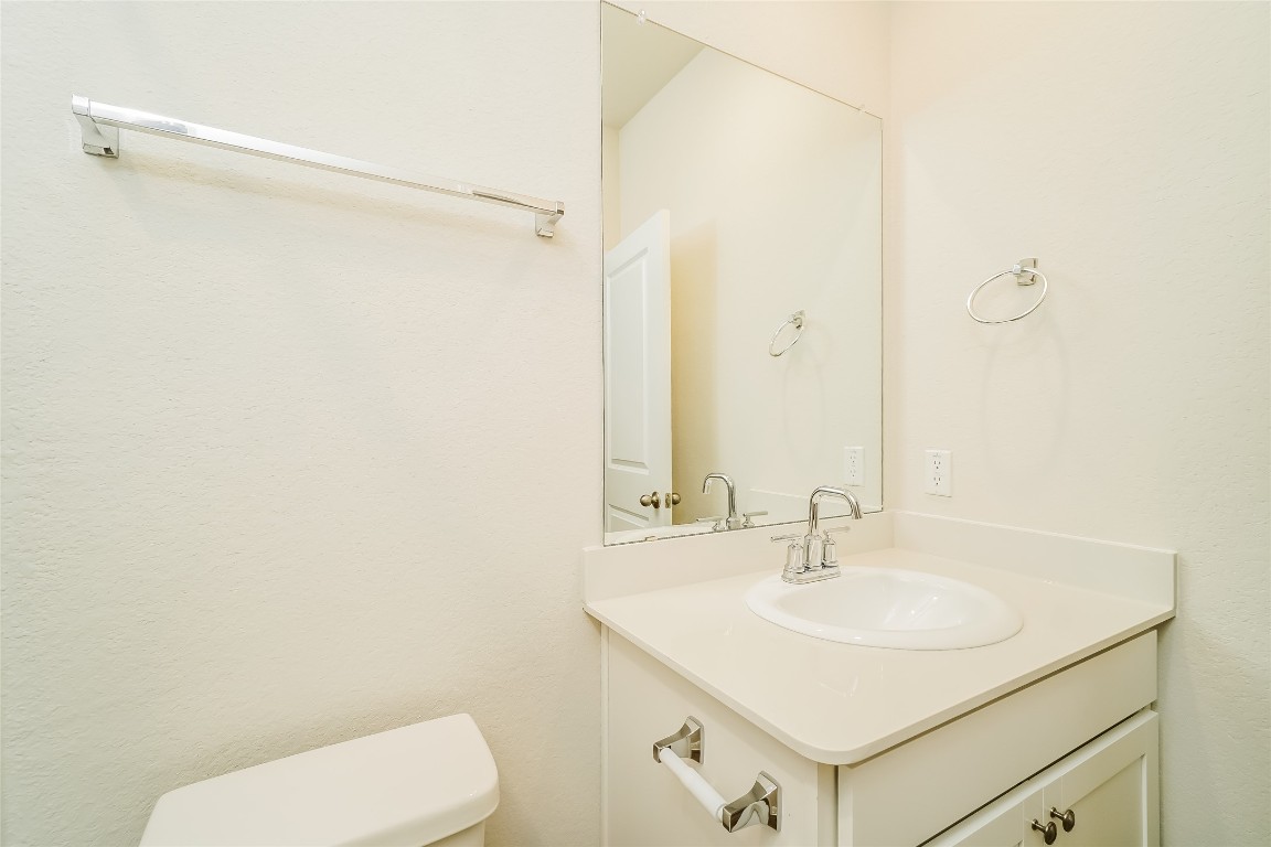 200 Babblebrook Way Hutto, TX 78634 - Photo 13 of 16 a bathroom with a sink toilet and shower