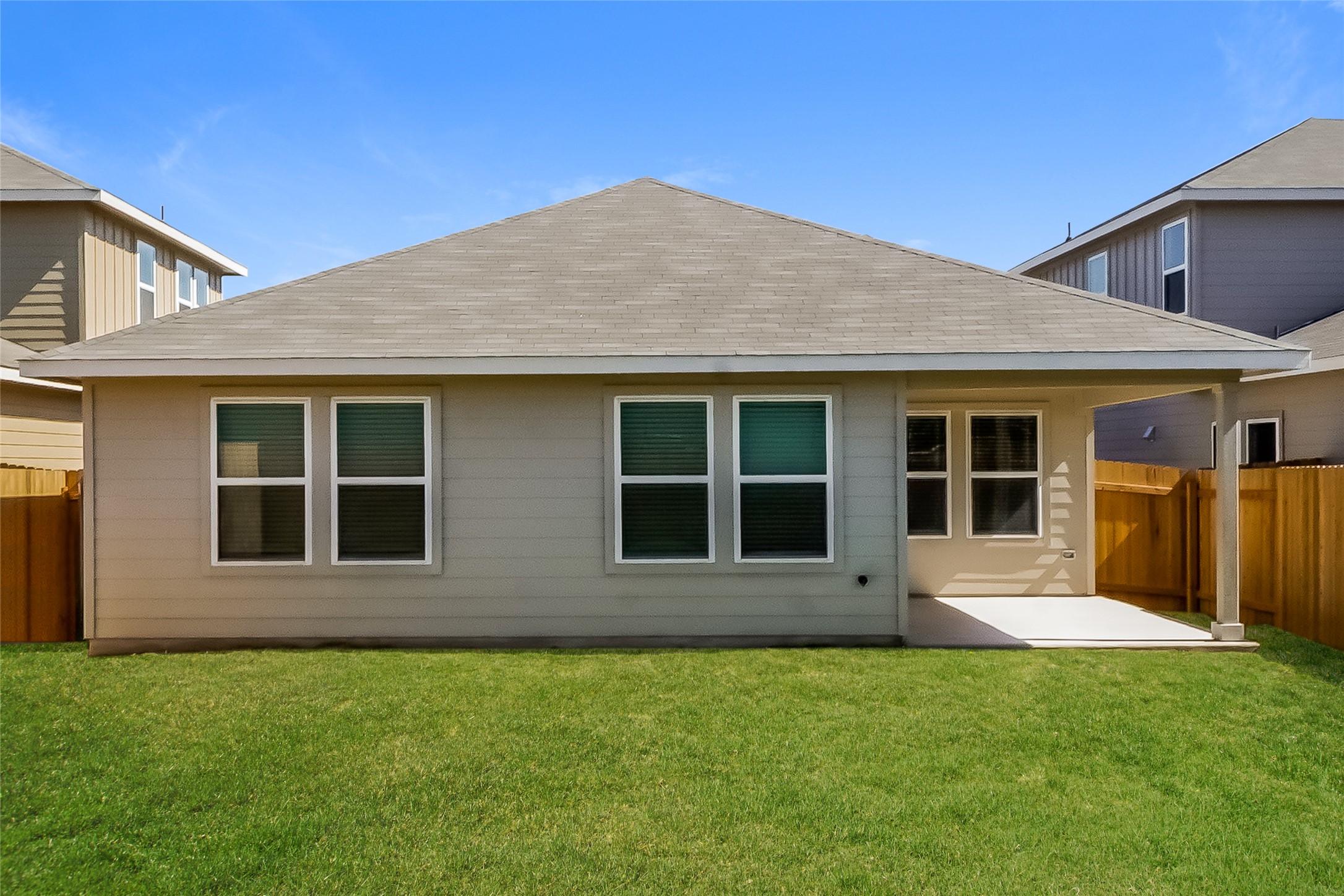200 Babblebrook Way Hutto, TX 78634 - Photo 15 of 16 front view of a house with a yard