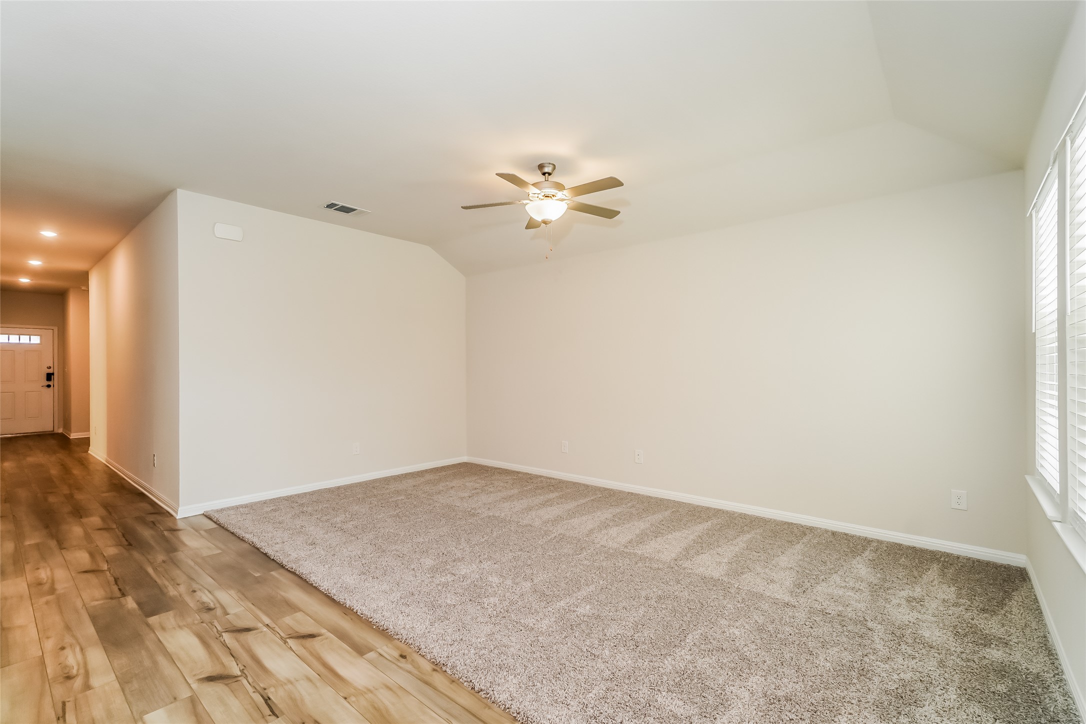 200 Babblebrook Way Hutto, TX 78634 - Photo 5 of 16 a view of a big room with carpet