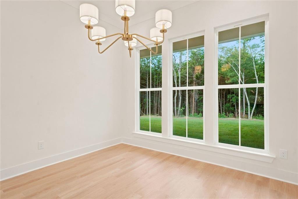 37 Kirk Road Northwest White, GA 30184 - Photo 17 of 55 a view of a room with wooden floor and windows