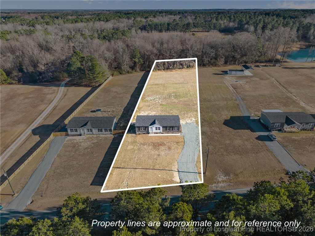849 Loop Road Bunnlevel, NC 28323 - Photo 36 of 39 a view of a tennis court