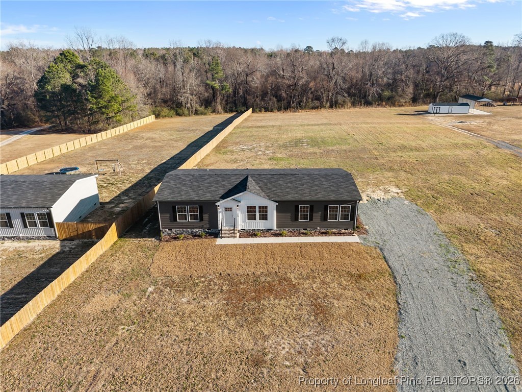 849 Loop Road Bunnlevel, NC 28323 - Photo 37 of 39 a view of house with yard and ocean view
