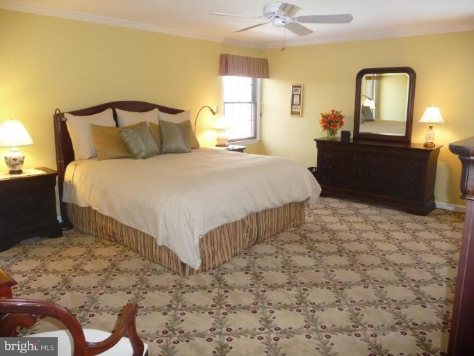 3165 Hickory Ridge Road Dunkirk, MD 20754 - Photo 14 of 30 a bedroom with a bed and a dresser