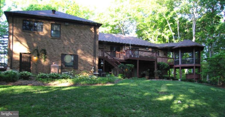 3165 Hickory Ridge Road Dunkirk, MD 20754 - Photo 27 of 30 a front view of a house with a garden