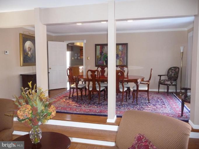 3165 Hickory Ridge Road Dunkirk, MD 20754 - Photo 6 of 30 a living room with furniture a table and a potted plant