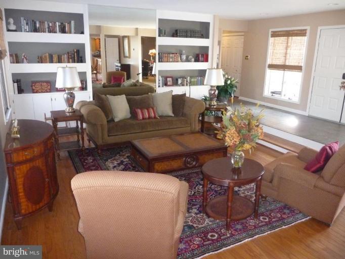 3165 Hickory Ridge Road Dunkirk, MD 20754 - Photo 8 of 30 a living room with furniture and a wooden floor