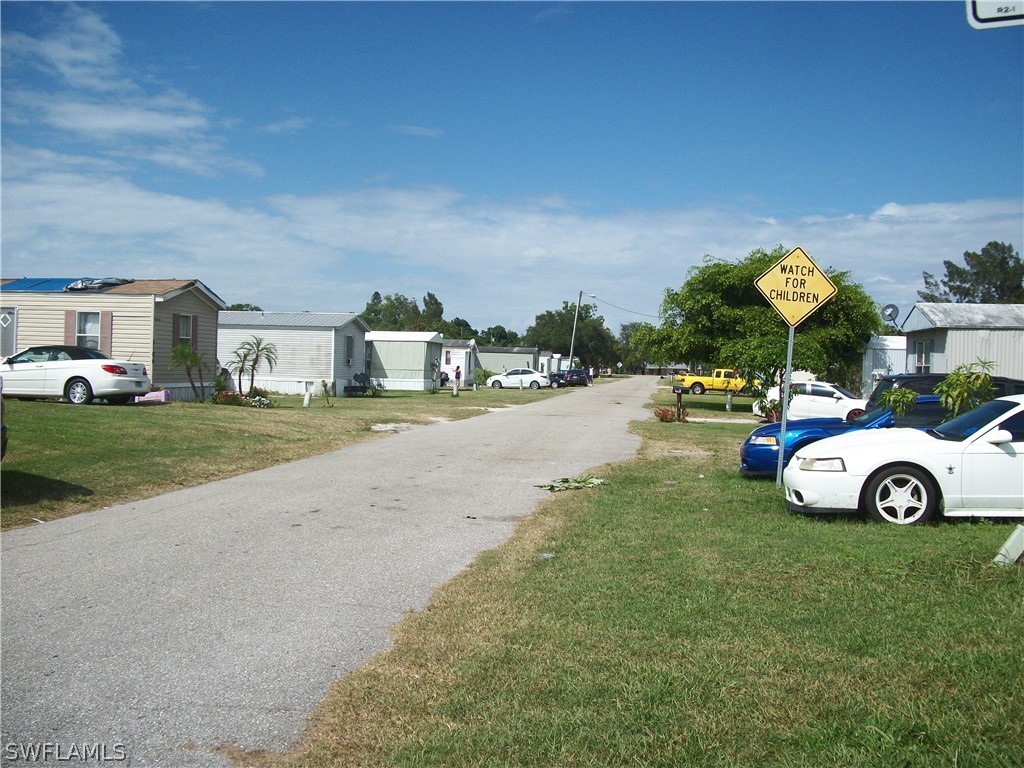 1002-1009 Nalls Road Clewiston, FL 33440 - Photo 9 of 19 a view of yard with car parked