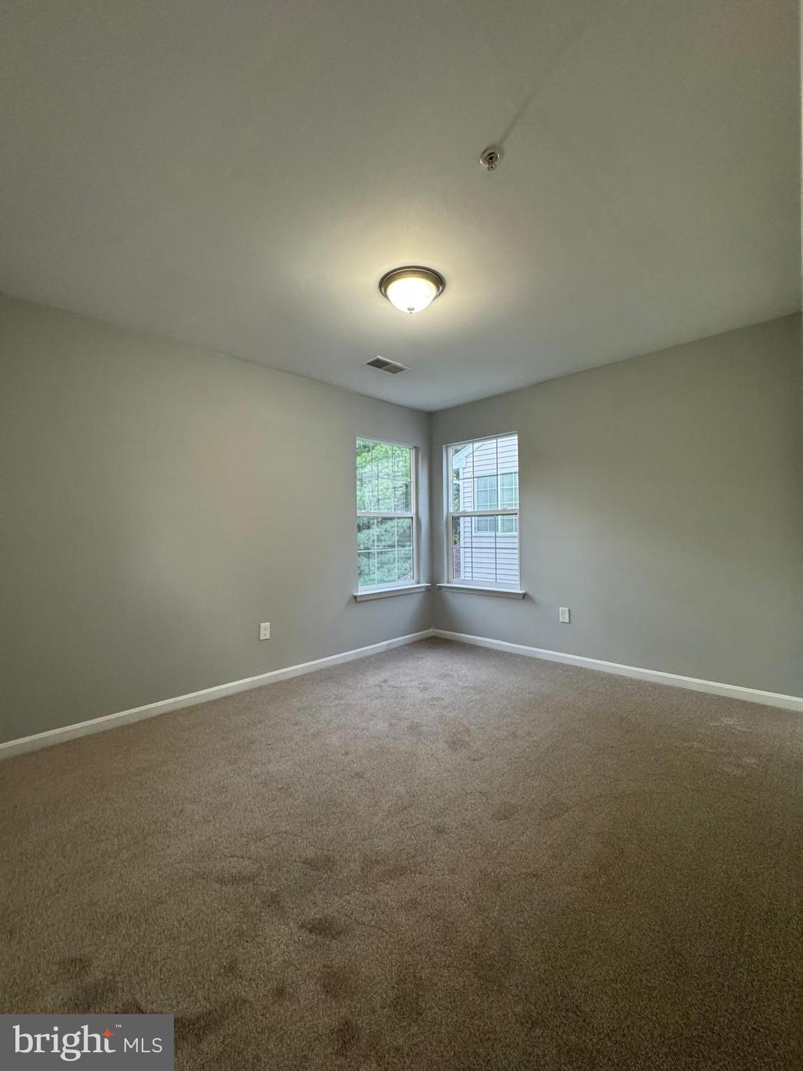 16107 Eckhart Road Bowie, MD 20716 - Photo 14 of 18 an empty room with a window