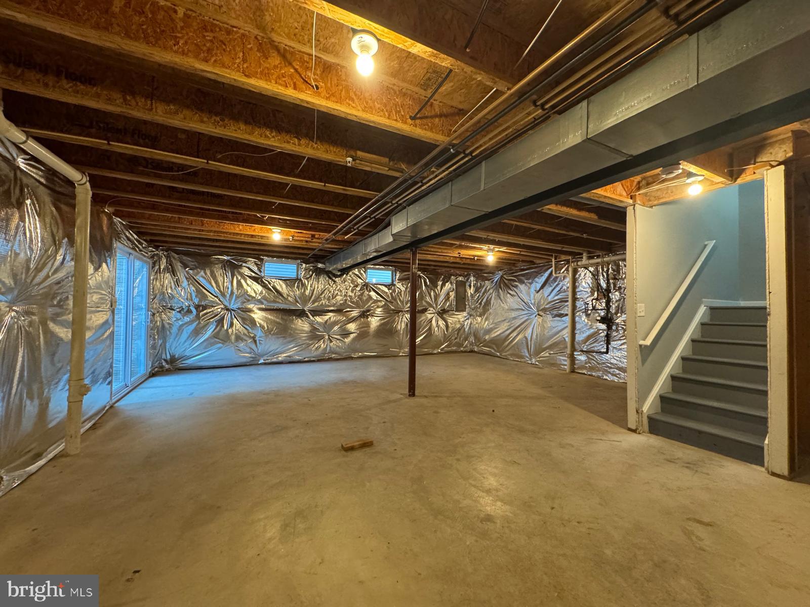 16107 Eckhart Road Bowie, MD 20716 - Photo 16 of 18 a view of an empty room with stairs