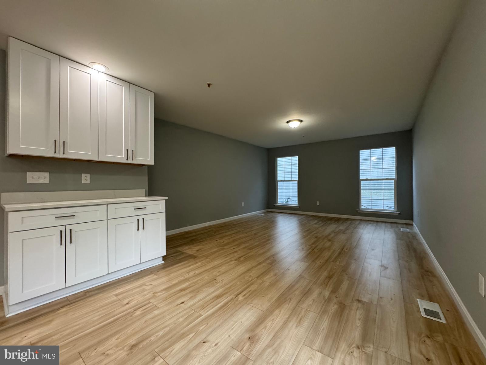 16107 Eckhart Road Bowie, MD 20716 - Photo 7 of 18 a view of cabinets and wooden floor