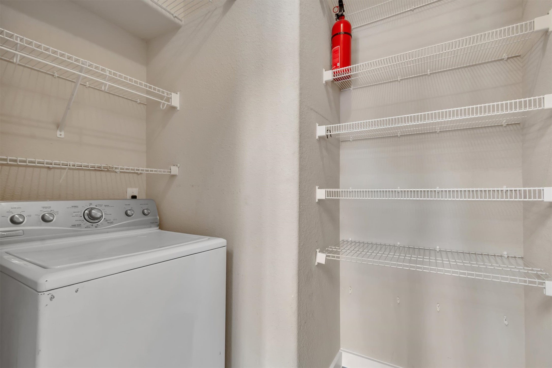 14815 Avery Ranch Boulevard, Unit 2A Austin, TX 78717 - Photo 20 of 27 A dedicated laundry space provides practical convenience.