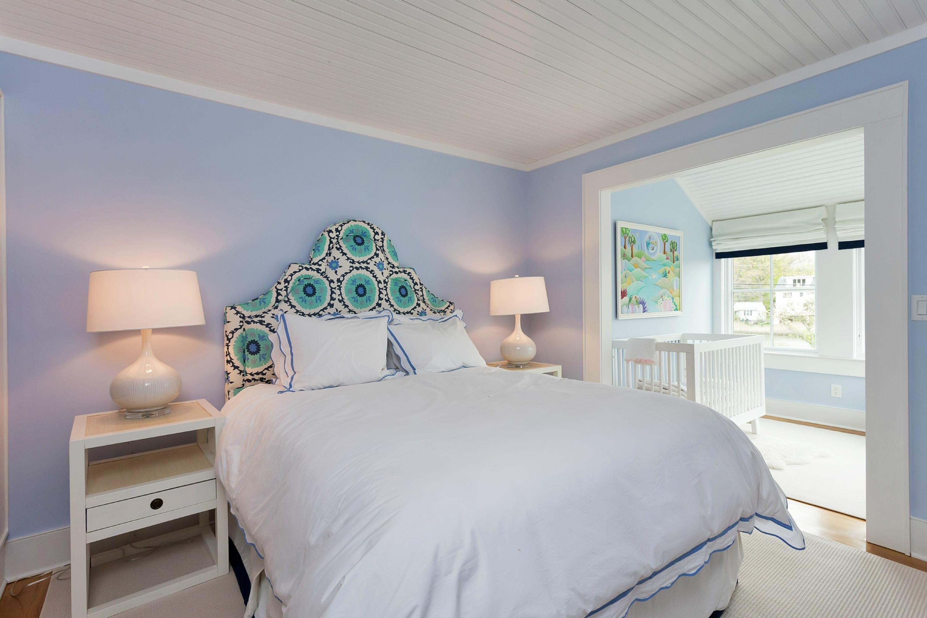 52 Roton Avenue Rowayton, CT 06853 - Photo 13 of 20 a bedroom with a bed and a window