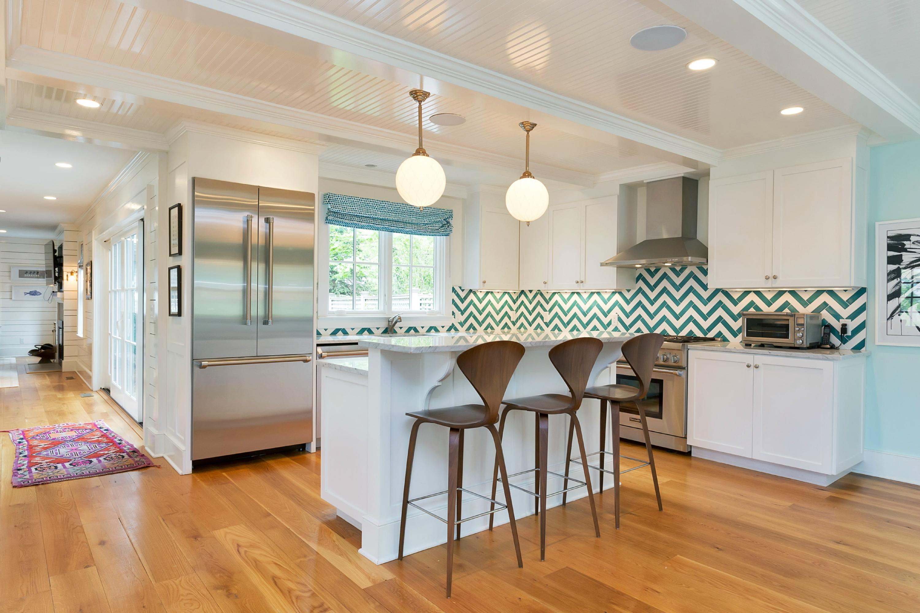 52 Roton Avenue Rowayton, CT 06853 - Photo 10 of 20 a kitchen with a table and chairs