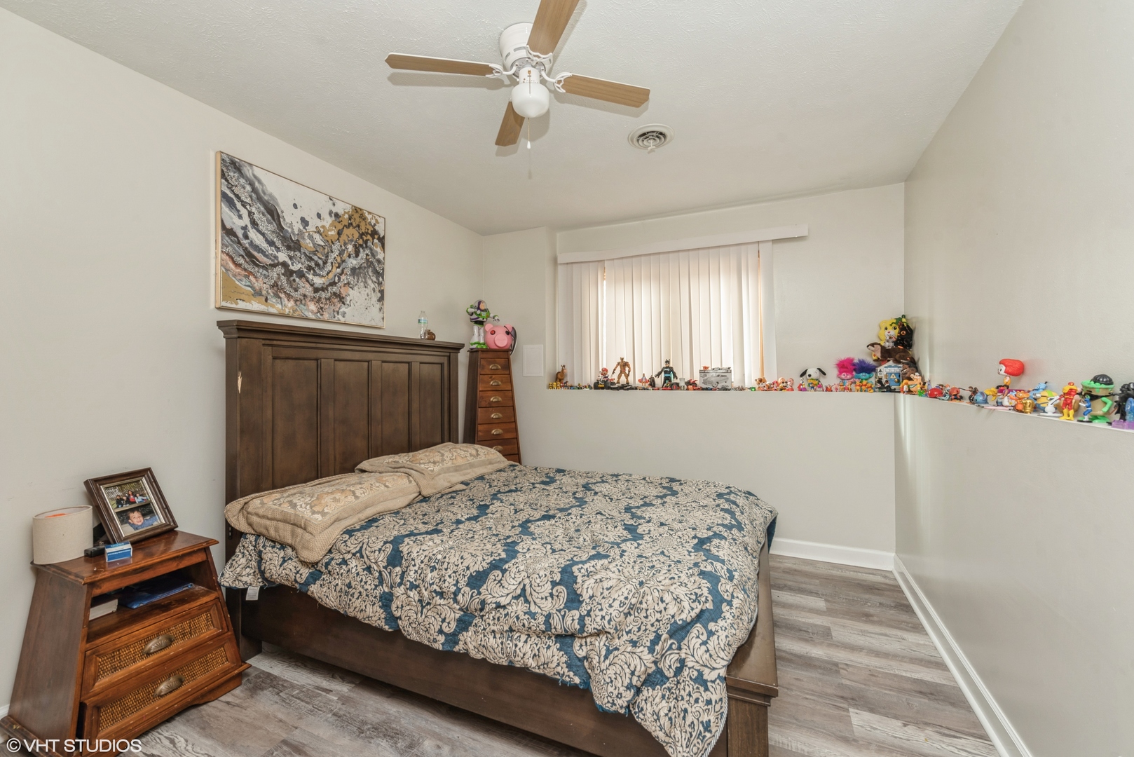 412 Lamplighter Loop Southeast Poplar Grove, IL 61065 - Photo 14 of 23 a bedroom with a bed and a dresser