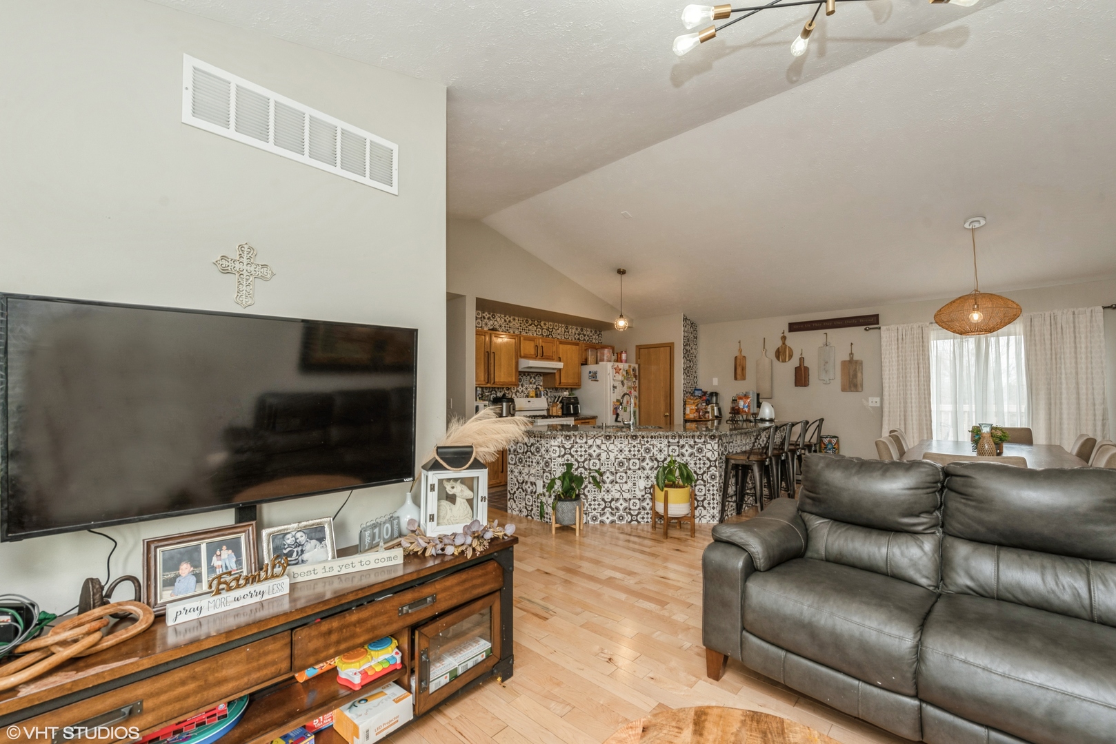 412 Lamplighter Loop Southeast Poplar Grove, IL 61065 - Photo 5 of 23 a living room with furniture and a flat screen tv