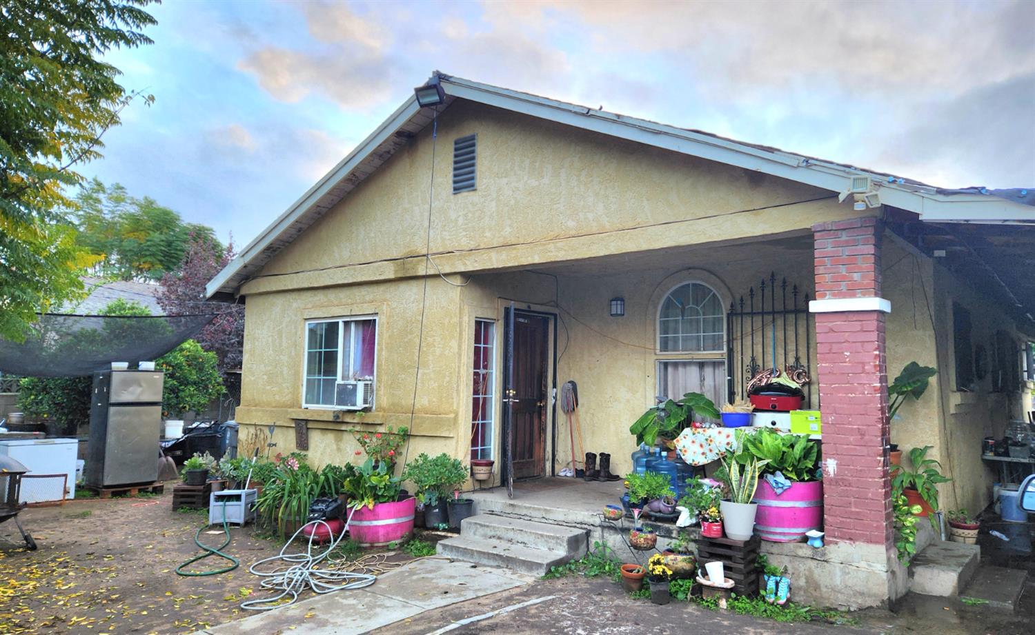 3793 Cottle Avenue Sanger, CA 93657 - Photo 1 of 4 a front view of a house