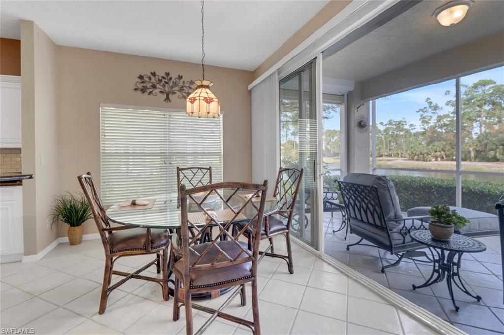 5325 Andover Drive, Unit 101 Naples, FL 34110 - Photo 11 of 25 Dining area with light tile patterned flooring