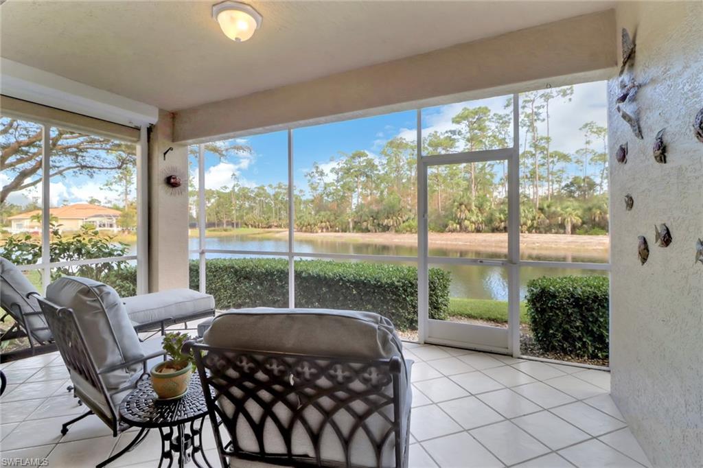 5325 Andover Drive, Unit 101 Naples, FL 34110 - Photo 21 of 25 Sunroom with a water view
