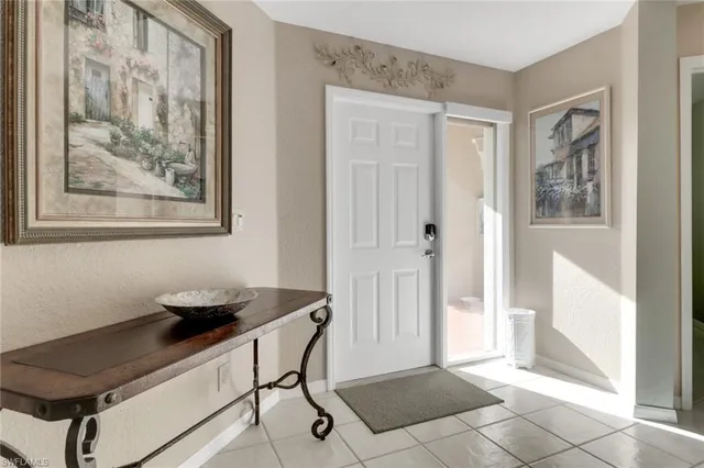 a dining room with a furniture and windows