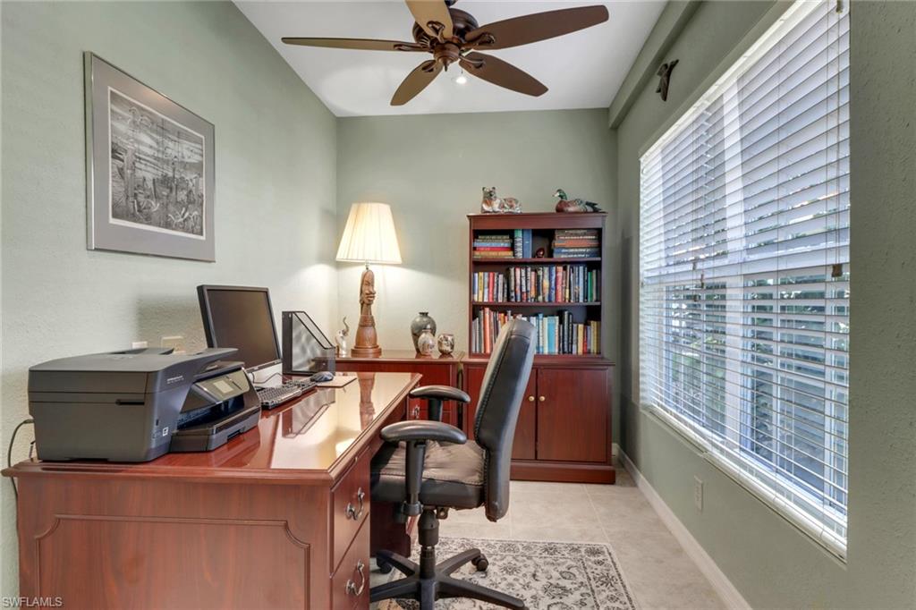 5325 Andover Drive, Unit 101 Naples, FL 34110 - Photo 6 of 25 Tiled office with a wealth of natural light and ceiling fan
