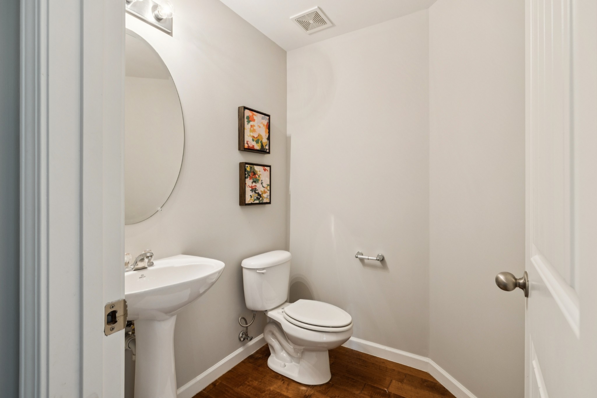 2040 Belshire Way Spring Hill, TN 37174 - Photo 23 of 74 a bathroom with a toilet sink and mirror