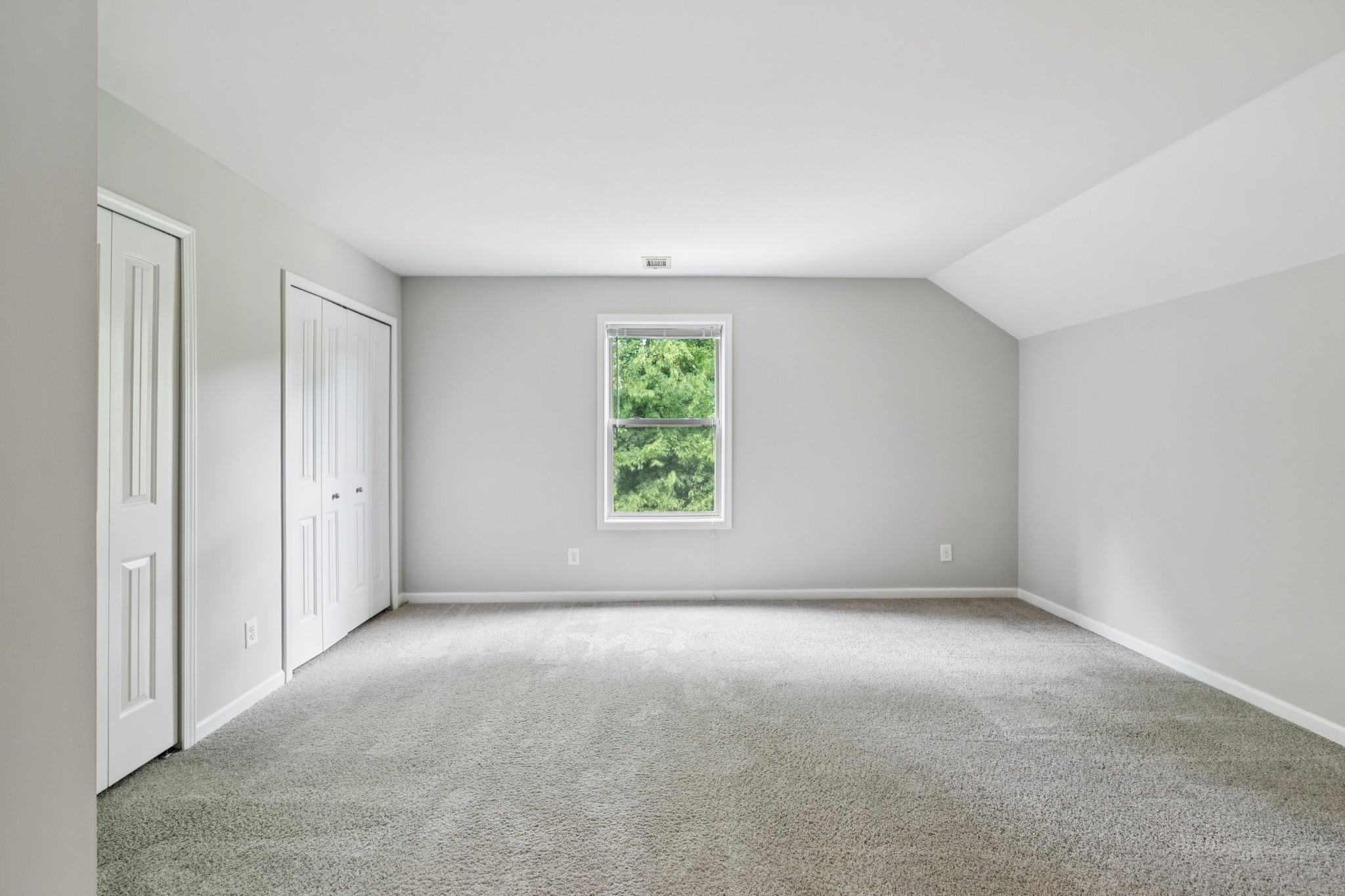 2040 Belshire Way Spring Hill, TN 37174 - Photo 46 of 74 a view of a big room with windows and chandelier fan