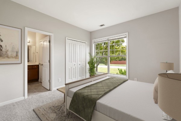 2040 Belshire Way Spring Hill, TN 37174 - Photo 52 of 74 a bedroom with a bed and a large window