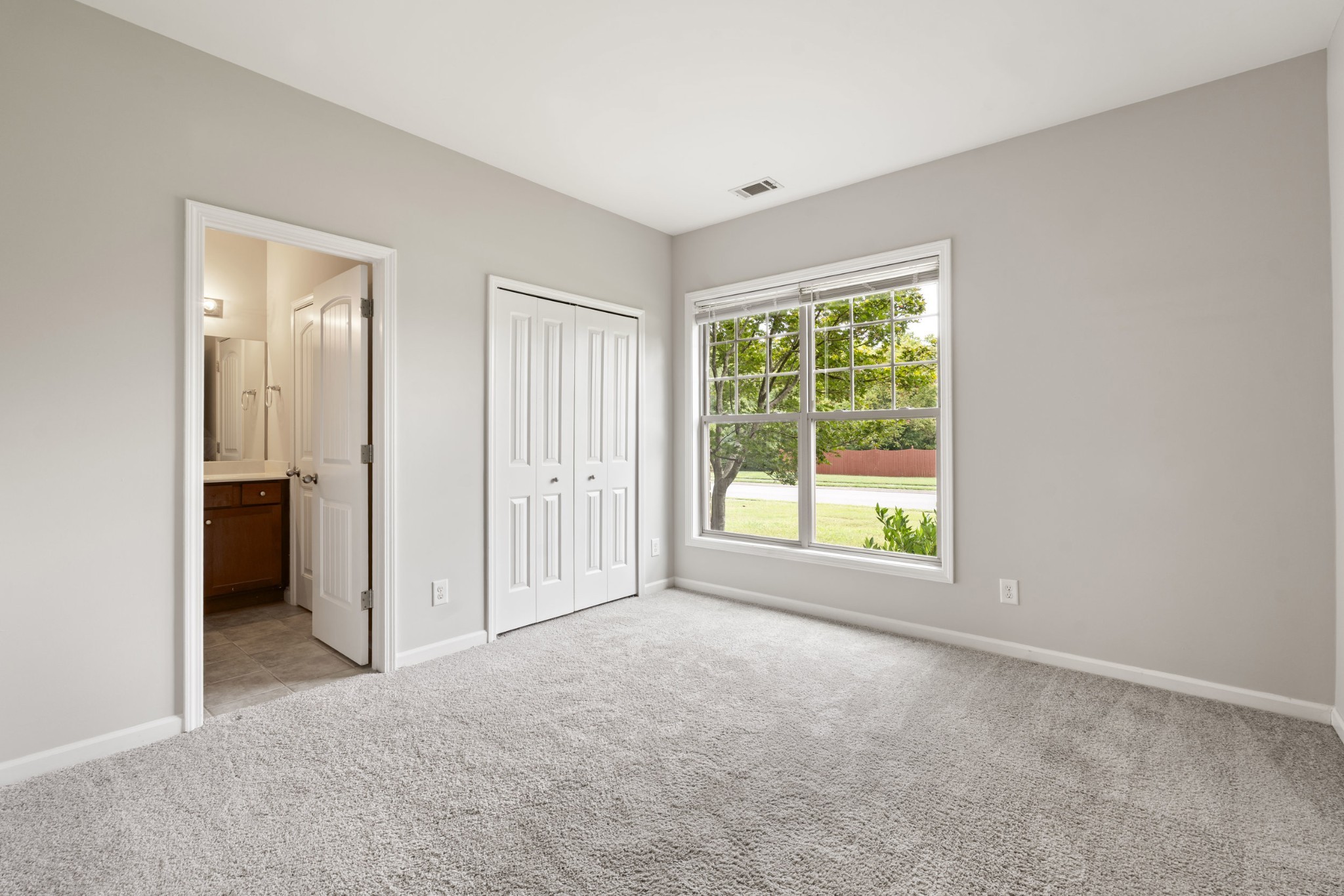 2040 Belshire Way Spring Hill, TN 37174 - Photo 53 of 74 an empty room with windows and closet