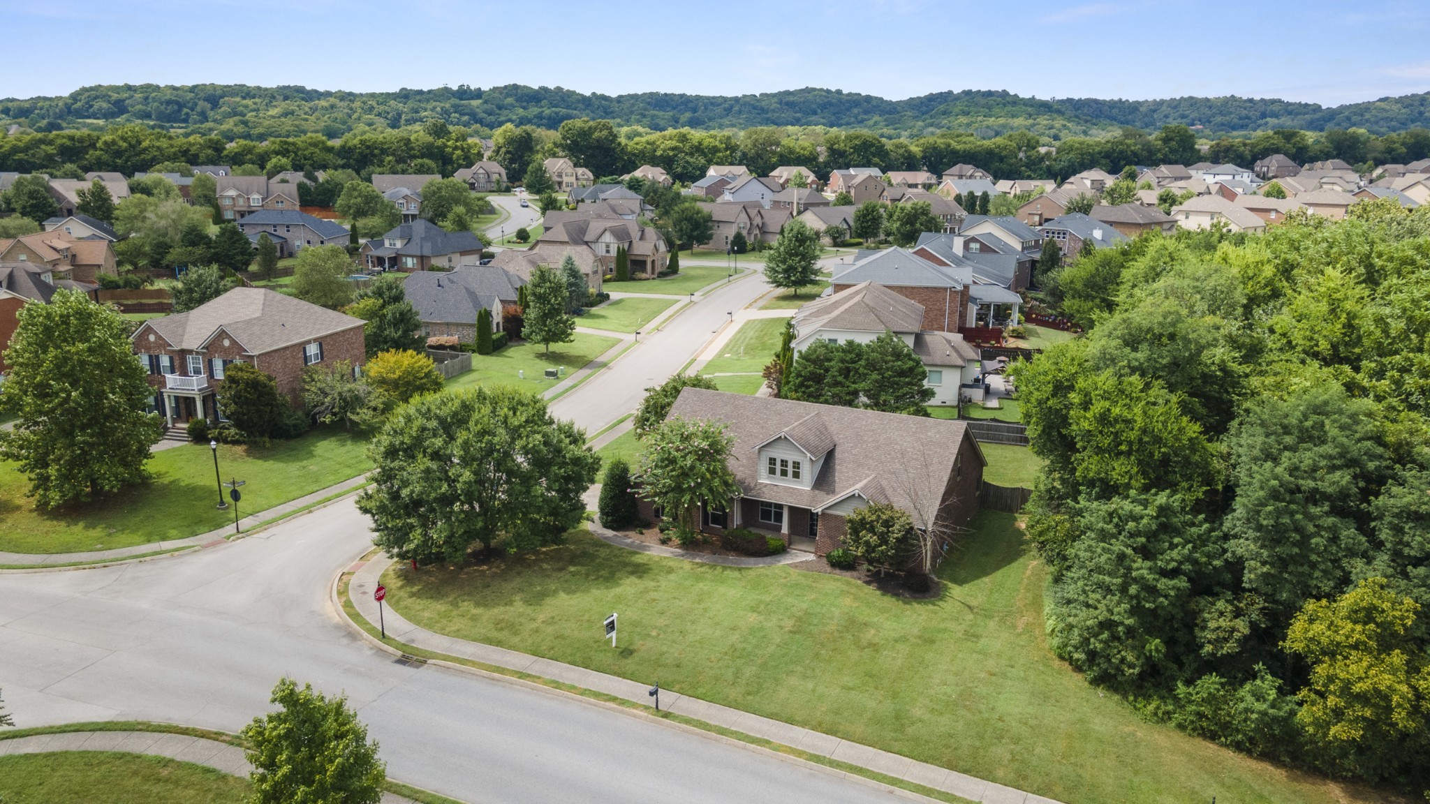 2040 Belshire Way Spring Hill, TN 37174 - Photo 65 of 74 an aerial view of a house with a garden