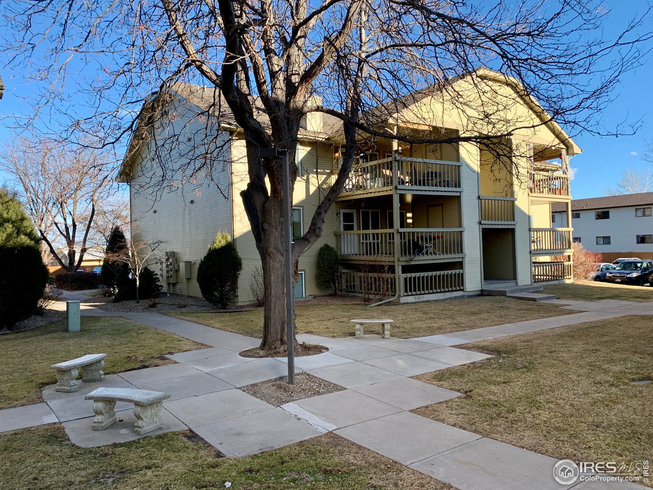 1672 Riverside Avenue, Unit 116 Fort Collins, CO 80525 - Photo 12 of 39 a view of a house with a yard