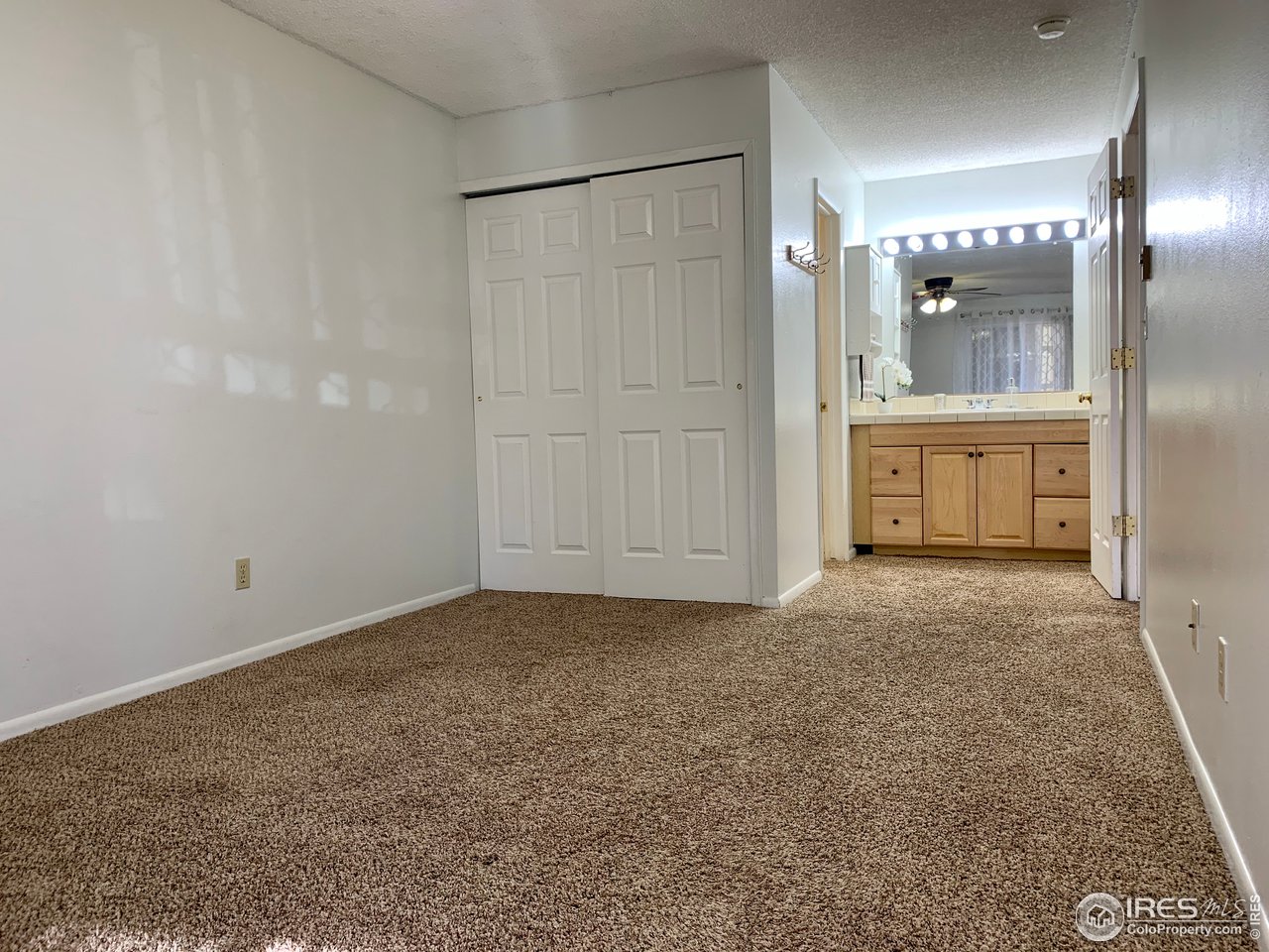 1672 Riverside Avenue, Unit 116 Fort Collins, CO 80525 - Photo 17 of 39 a view of an empty room