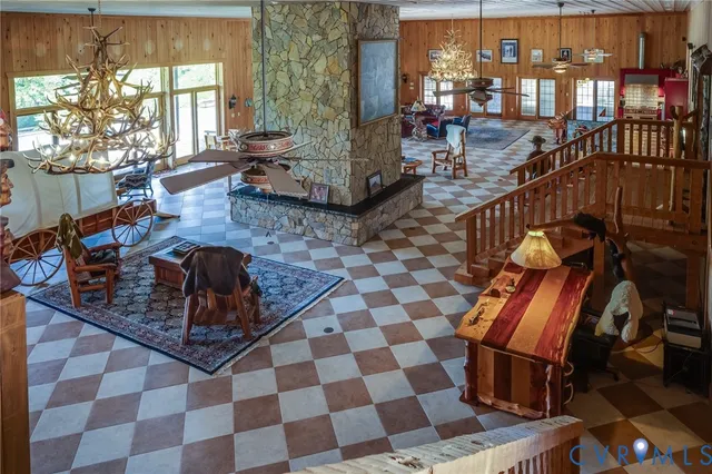 a living room with furniture and a rug