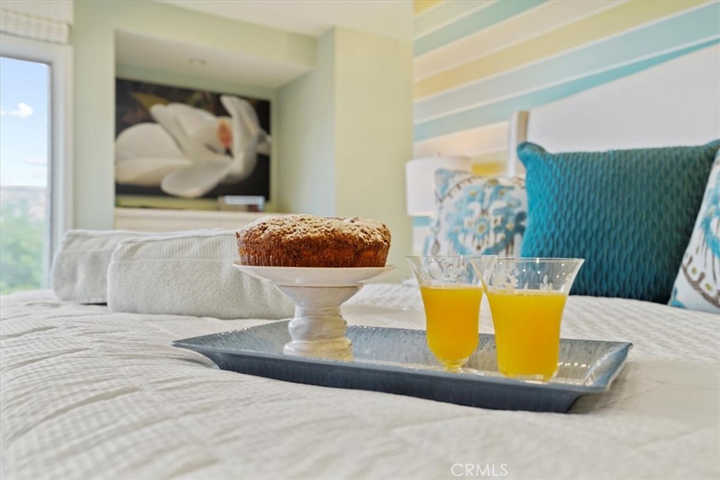 437 Emerald Bay Laguna Beach, CA 92651 - Photo 17 of 61 a living room with a couch and a potted plant