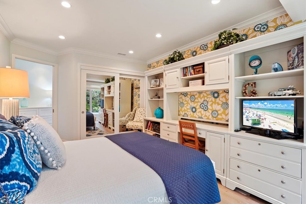 437 Emerald Bay Laguna Beach, CA 92651 - Photo 27 of 61 a bedroom with a bed and a flat screen tv