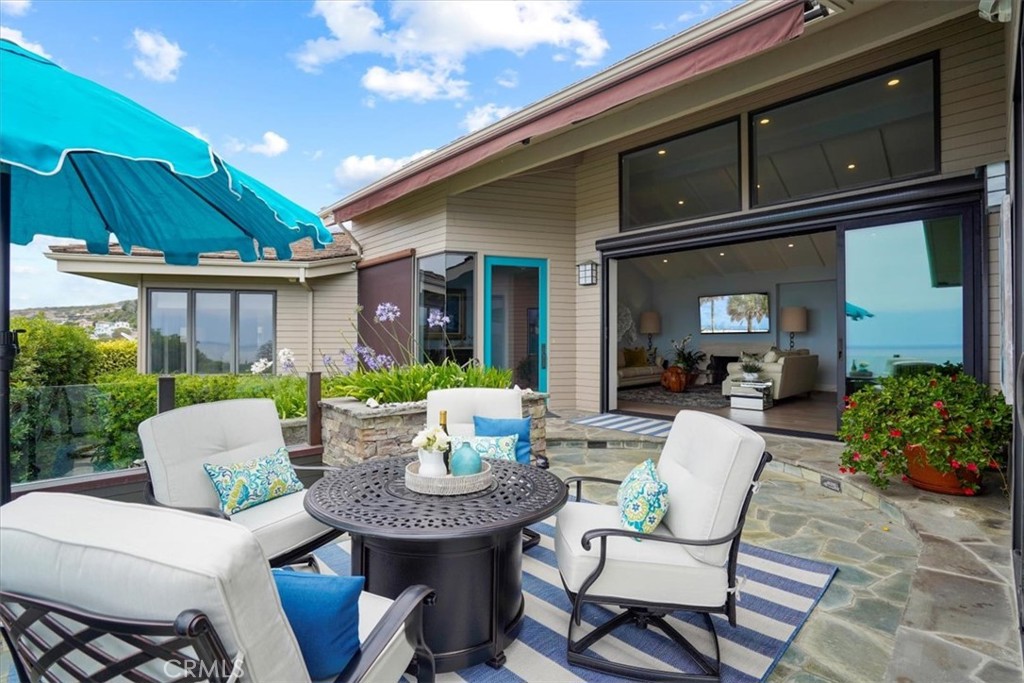 437 Emerald Bay Laguna Beach, CA 92651 - Photo 36 of 61 a view of a house with backyard and sitting area