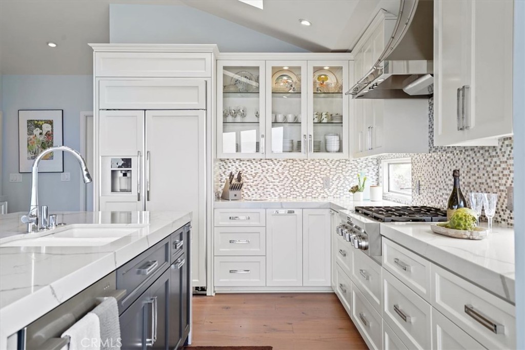 437 Emerald Bay Laguna Beach, CA 92651 - Photo 46 of 61 a kitchen with cabinets appliances a sink and a counter top space