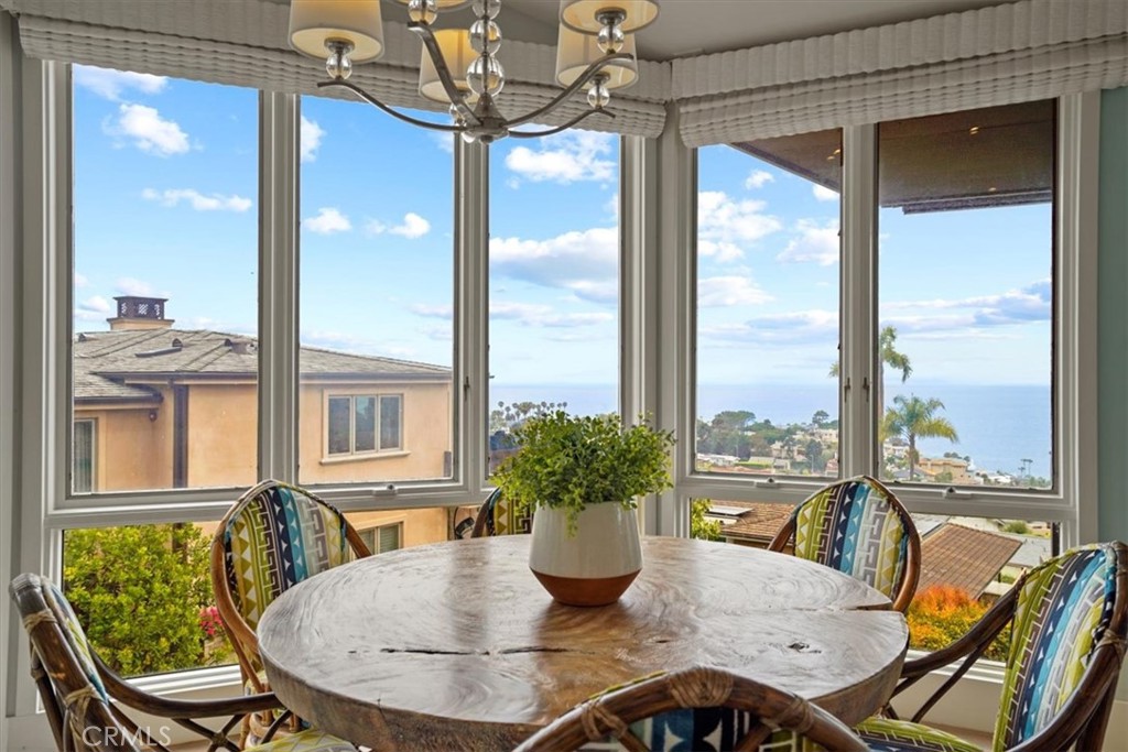 437 Emerald Bay Laguna Beach, CA 92651 - Photo 47 of 61 a view of a dining room with furniture window and outside view