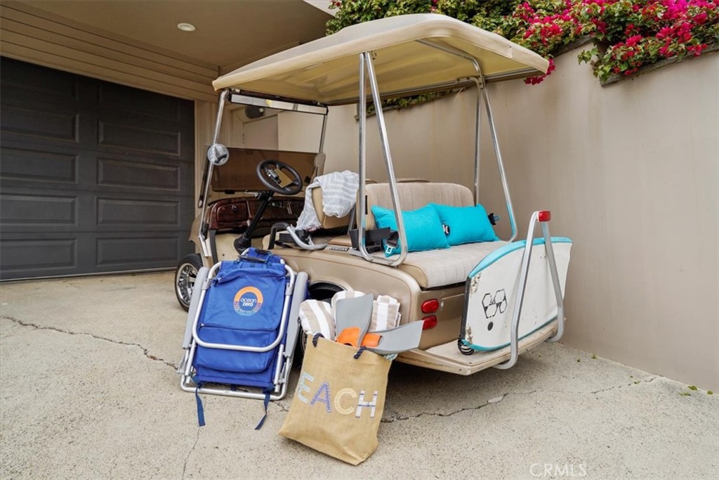 437 Emerald Bay Laguna Beach, CA 92651 - Photo 56 of 61 a blue and white umbrella sitting in front of a building