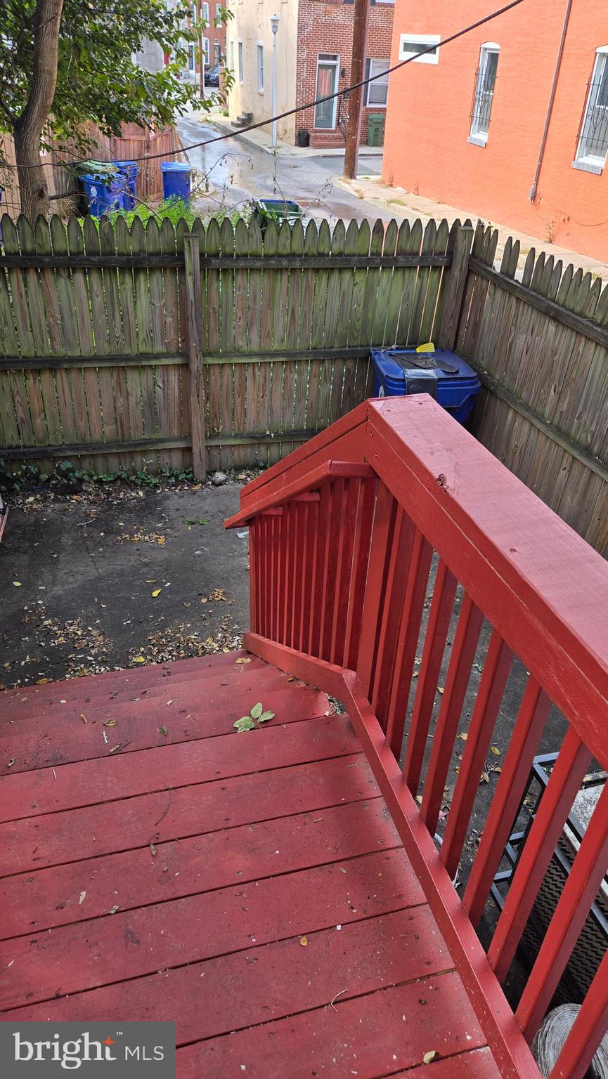 638 Wyeth Street Baltimore, MD 21230 - Photo 13 of 14 a view of a backyard with sitting area