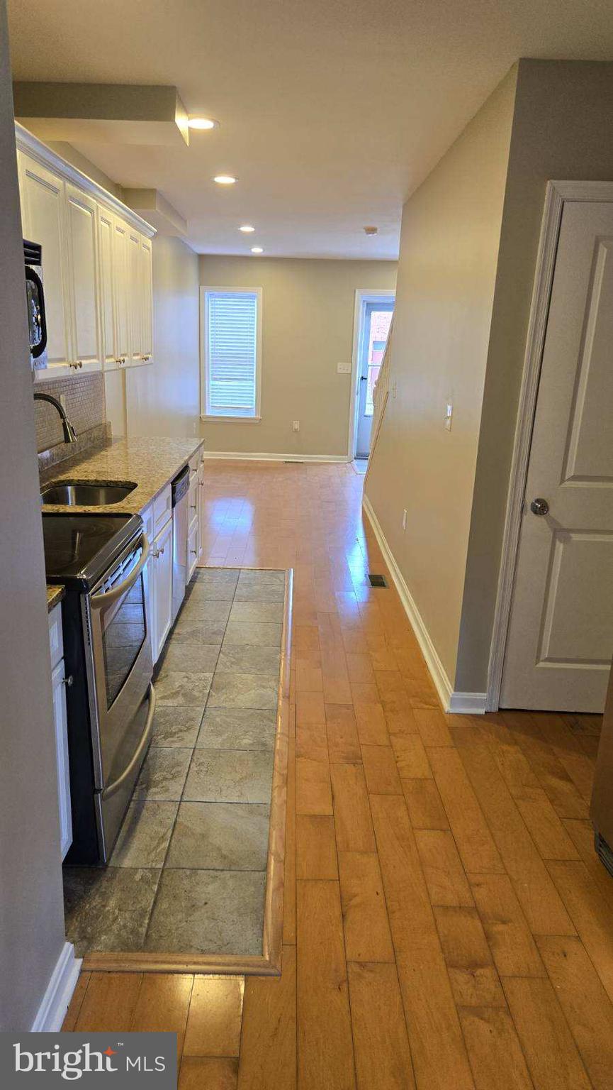 638 Wyeth Street Baltimore, MD 21230 - Photo 2 of 14 a view of entryway with kitchen