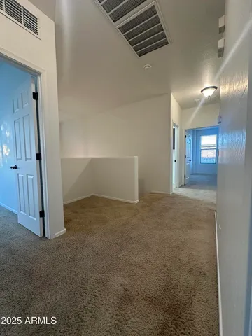 a view of a backyard with a fountain