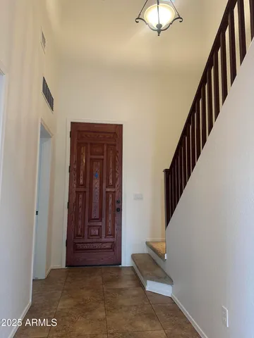 a view of an entryway with staircase