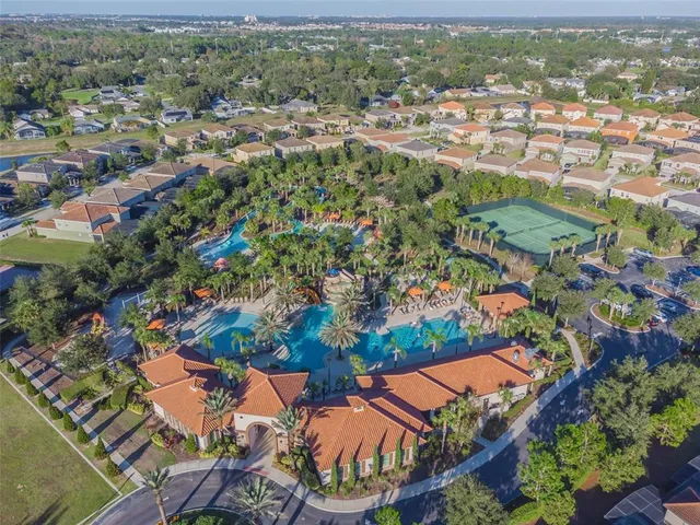 a bathroom with a shower curtain and a toilet