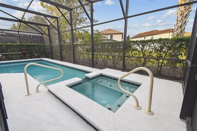 a view of a chairs and table in the patio