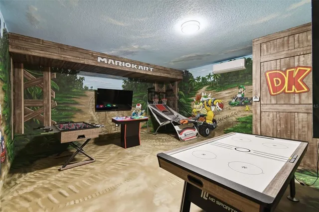 a kitchen with a stove a sink and a refrigerator