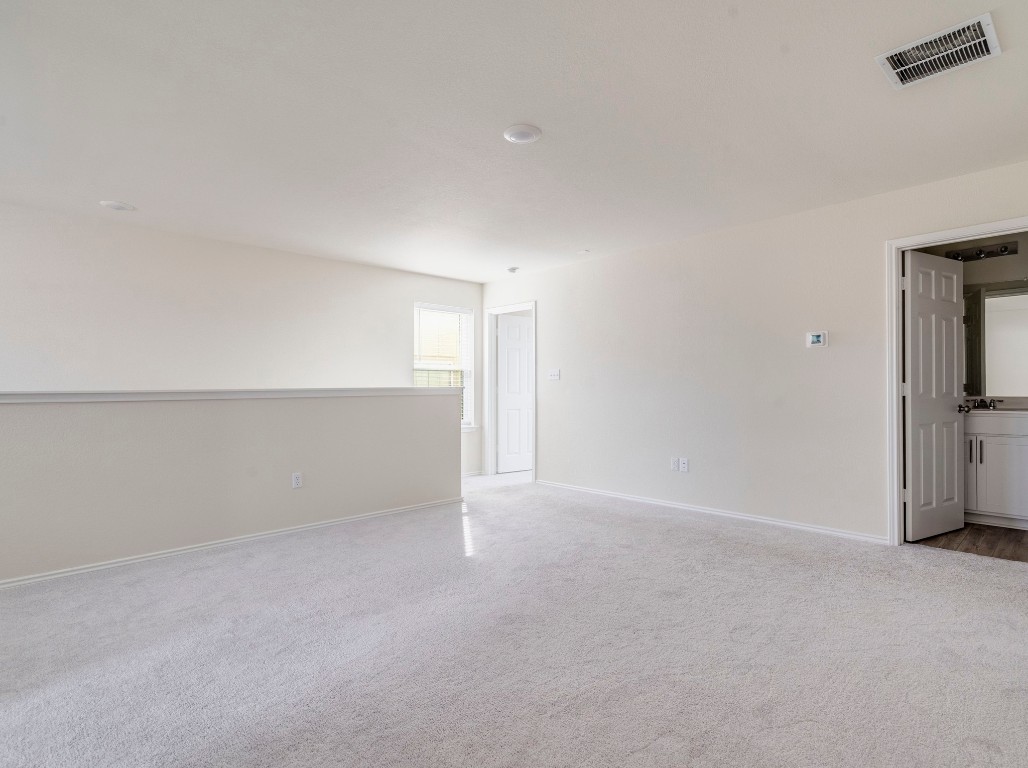 453 Tree Nut Loop Buda, TX 78610 - Photo 14 of 32 Upstairs flex space offers great versatility.