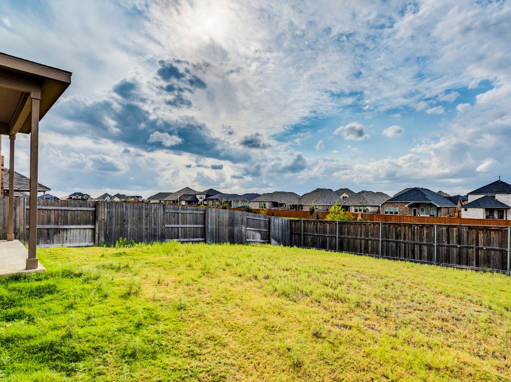 453 Tree Nut Loop Buda, TX 78610 - Photo 25 of 32 Great elevation lends to privacy in your back yard.