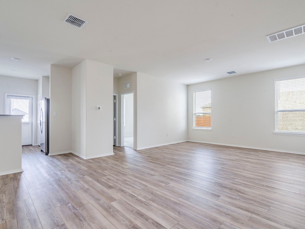 453 Tree Nut Loop Buda, TX 78610 - Photo 3 of 32 Lots of natural light flooding the open and functional layout!