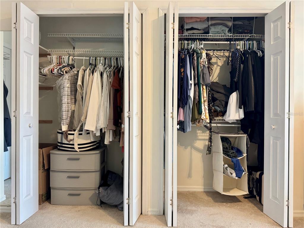 5169 Lazy Oaks Drive Winter Park, FL 32792 - Photo 17 of 25 a view of walk in closet with clothes and shoes